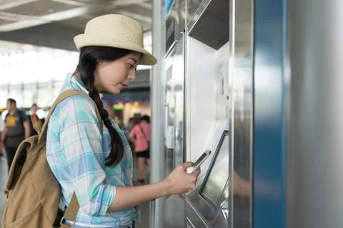 Tourist backpacker using smart phone pay 스톡 사진