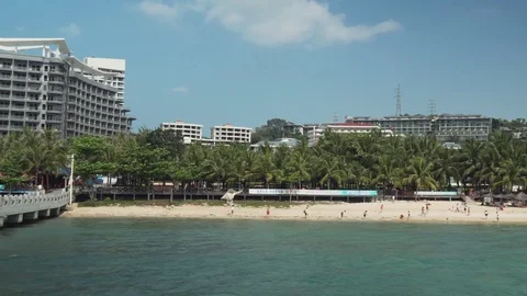 Tourist bay of Dadonghai on the island of Hainan on a hot spring day stock Stock Footage