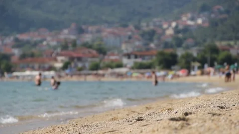 Tourist on the beach Stock Footage 77916954