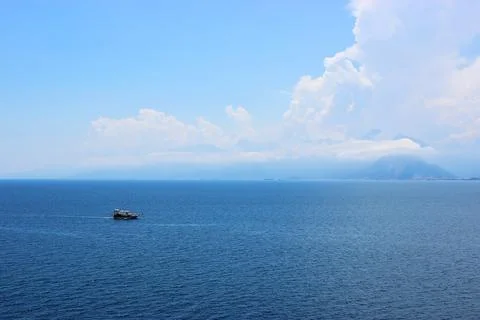 A tourist boat against the backdrop of the Mediterranean Sea Stock Photos