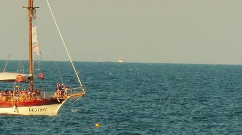 Tourist boat that carries people around the town of Sozopol on the Black Sea Stock Footage