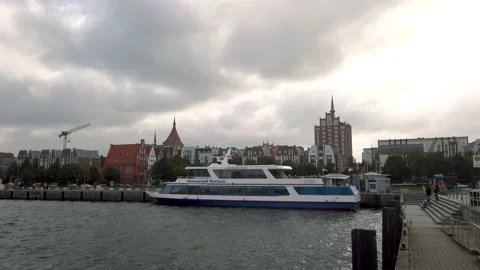 A tourist boat lying in the inner City port in Rostock. Stock Footage