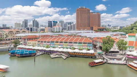 Tourist boats docking at Clarke Quay habour aerial timelapse. Stock Footage