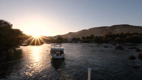 Tourist boats float on the Nile River, at Aswan Egypt 動画素材 287105959
