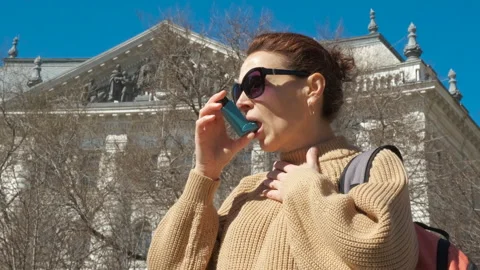 Tourist with breathing problems in city. Stock Footage 261465964