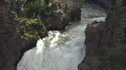 Tourist brink Upper Falls Yellowstone Grand Canyon powerful 4K Stock Footage 51673261