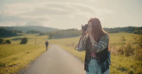 Tourist Clicking Pictures While Exploring Meadow Stock Footage 252018463