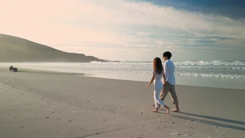 Tourist Couple Holding Hands While Walking Stock Footage 227305646