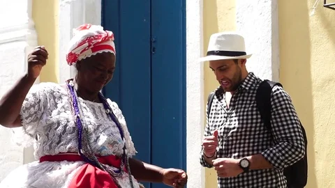 Tourist dancing and have fun with local "Baianas" in Salvador, Bahia, Brazil Stock Footage 80441912
