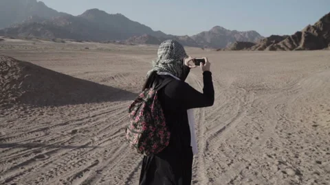 A tourist in the desert Stock Footage 86333509