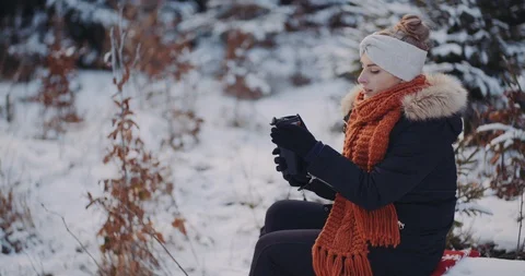 Tourist Drinking Coffee in Woods in Winter Stock Footage 123728127