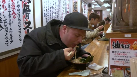 Tourist Eats Ramen In A Restaurant In Tokyo, Japan Stock Footage 158999360