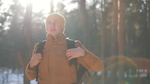 Tourist in equipment with backpack relaxes in nature on weekend. Nature beckons Stock Footage 311637553