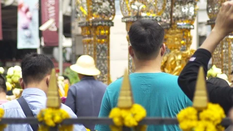 Tourist at Erawan Shrine at Ratchaprasong intersection, 20 May 2018, Bangkok, Stock Footage 90051848