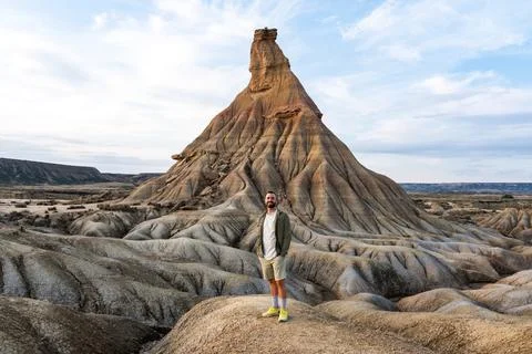 Tourist exploring the unique rock formations of bardenas reales, navarre, spain Stock Photos