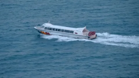 Tourist ferry makes an interesting excursion to a Ha Long Bay Stock Footage 303180309