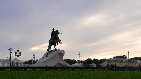 Tourist groups rush around Bronze Horseman, Senate Square timelapse at evening Stock Footage 71971840