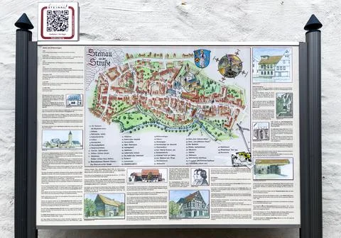 Tourist information board with QR code public city map of the old town and 스톡 사진