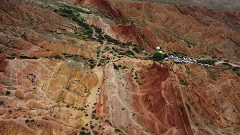 Tourist infrastructure and clay formations at Fairytale Canyon Skazka Kyrgyzstan Stock Footage 342829852