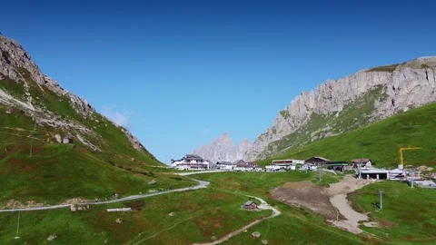 Tourist infrastructure developing in a mountainous valley in the Dolomites Video stock 342510361