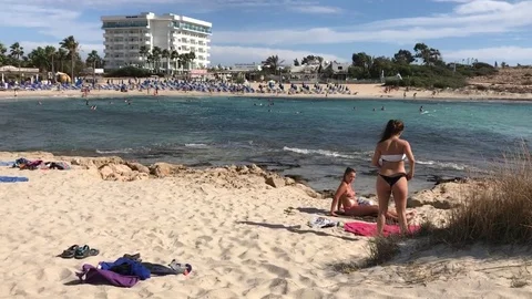 Tourist Lay Down to a Sandy Beach in Cyprus Stock Footage 101248441