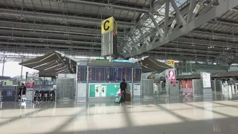 Tourist looking for flight schedule. Delay and canceled effect by COVID-19. Stock Footage 157364759