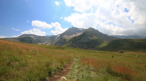 Tourist man in mountain with backpack Stock Footage 53848815