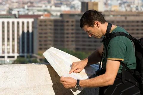 Tourist with map Stock Photos