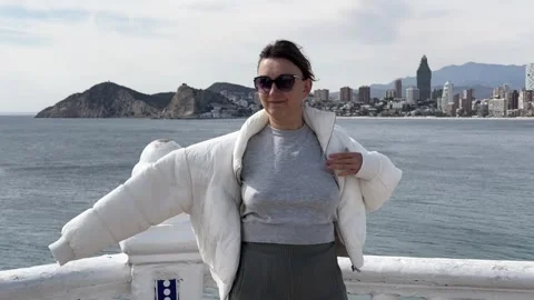 Tourist observing Benidorm skyline Stock Footage 303428525