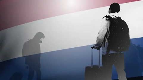A tourist or an immigrant with a backpack and a suitcase against the backdrop of Stock Footage 241324766