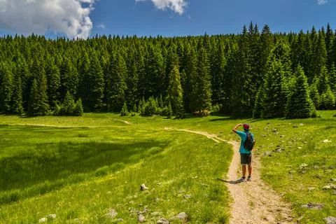 A tourist on a path in Durmitor Stock Photos