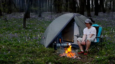 Tourist Roasting Marshmallows campfire. Stock Footage 63447529