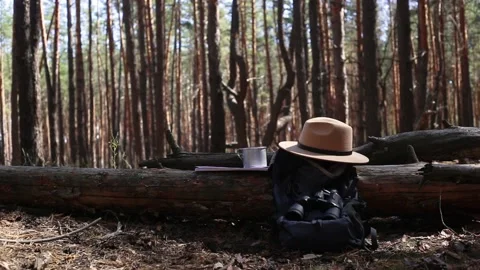 Tourist s backpack, binoculars, a map and equipment for a hike Stock Footage 150260037
