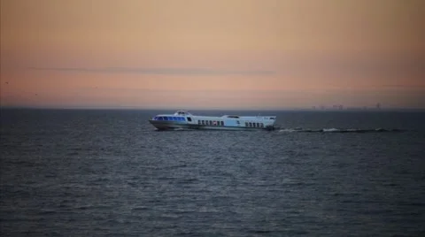 Tourist ship in sunset light, slow motion Stock Footage 45814062