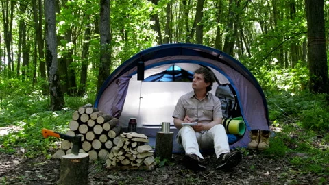 Tourist Takes Notes In A Notebook. Stock Footage 98491476