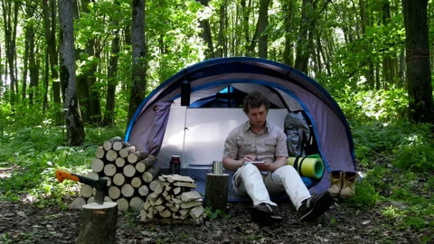 Tourist Takes Notes In A Notebook. Stock Footage 103835679