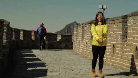 Tourist Taking Selfie on Mutianyu Section of Great Wall in Beijing, China Stock Footage 345824642