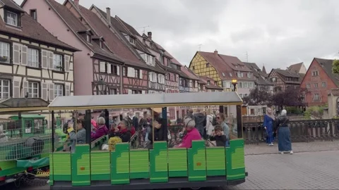 Tourist train passing through La Petite Venise Stock Footage 291859507