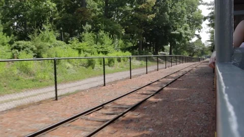 Tourist train tracks viewed from moving train Stock Footage 345281312