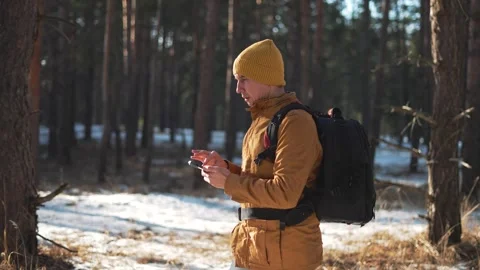 Tourist uses navigation to explore forest paths. Navigation aids for tourist Video stock 315341431