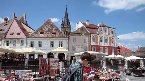 Tourist using GPS, tablet computer, facade,beautiful architecture, medieval town Stock Footage 44891033