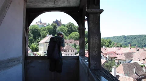 Tourist using a guide, travel, vacation, visit old medieval town, Transylvania Stock Footage 44892902