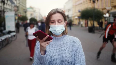 Tourist using smartphone voice recognition message on speakerphone. Portrait of Stock Footage 141539935