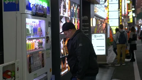 Tourist Using Vending Machine In Shinjuku, Tokyo, Japan Stock Footage 159075760