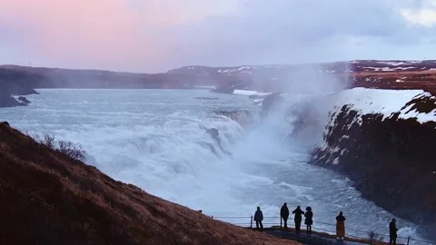 Tourist visit stand on viewpoint Gullfoss waterfall in Iceland, Cinematic b.. Vídeos de archivo 238486459