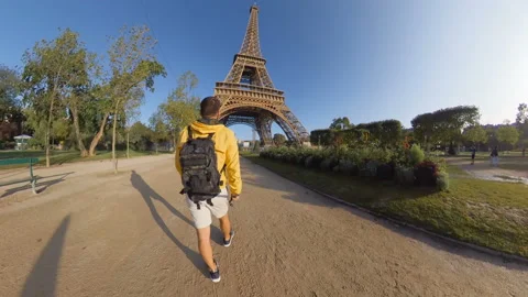 A tourist visiting the Eiffel tower in Paris, France.Third person point of view. Video stock 143539434