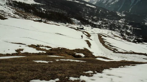 Tourist walking in the Alps. Stock Footage 48139996