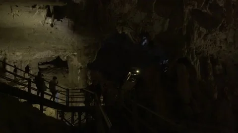 Tourist walking and exploring Cave in Mulu National Park  動画素材 231275860