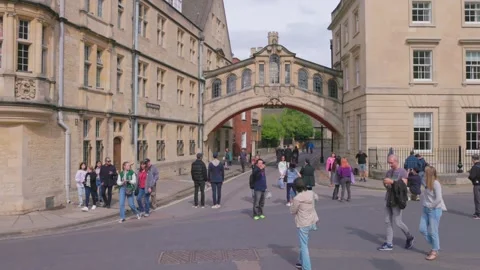Tourist walking around the New College Lane, Oxford, UK Stock-Footage 246563953
