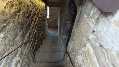 Tourist walking down the stairs from the viewpoint on Palazzo Vecchio in Flor Stock Footage 141588945